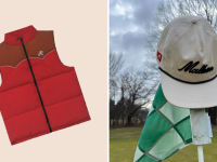 A red puffy vest and a white Malbon golf hat atop a golf flagstick.