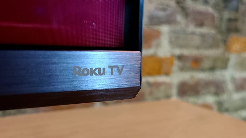 The Roku TV logo, as seen on the bottom of the TCL 6-Series panel