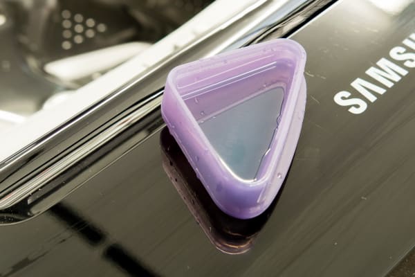 The Aqua Pebble is a detergent measuring cup for the upper washer.