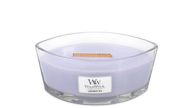 Oval shaped purple woodwick candle
