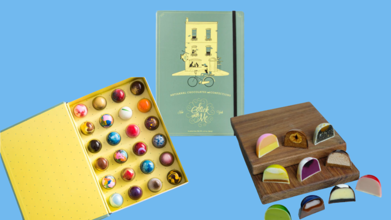 Box of chocolate, bonbons, and a book against blue background