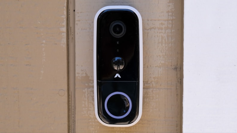Abode Wireless Video Doorbell mounted outside of home.