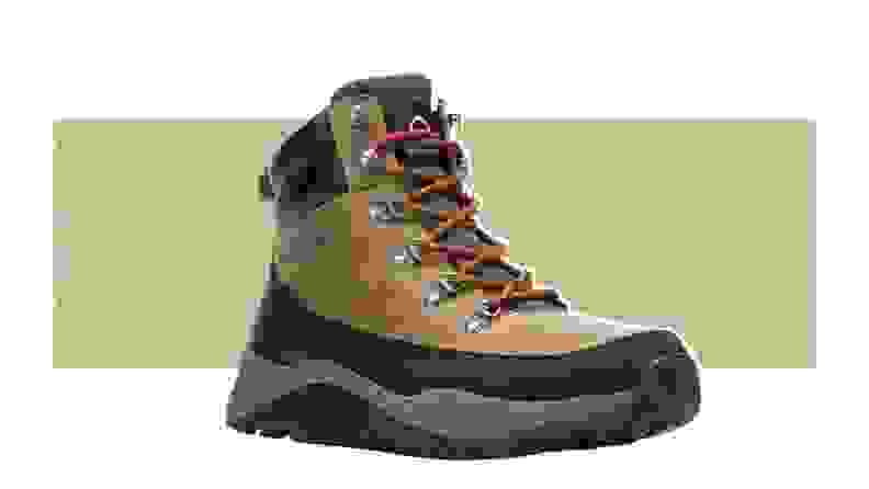 A Wolverine boot on a green background.