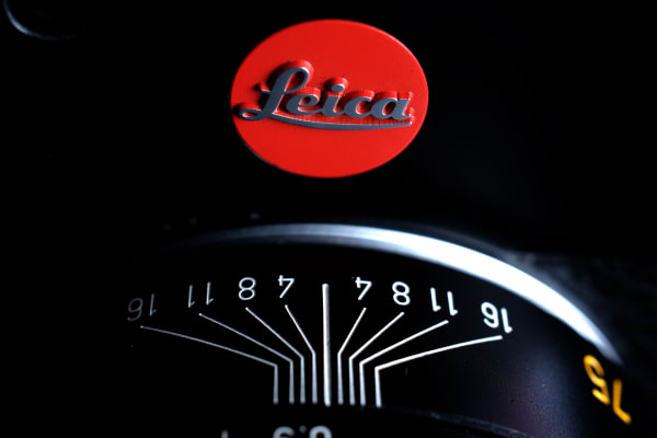 The Leica M places the iconic red dot front and center.