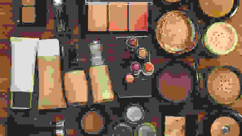 A photo of makeup laying out on a table.