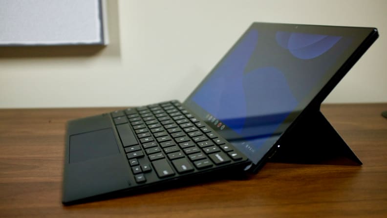 A side view of the CM3 with the keyboard attached and the kickstand extended.