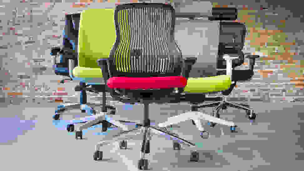 Several office chairs in a room