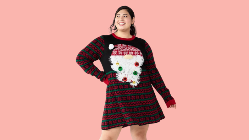 Collage of a woman wearing a sweater dress with the face of Santa on it, where the tinsel makes up Santa's beard.