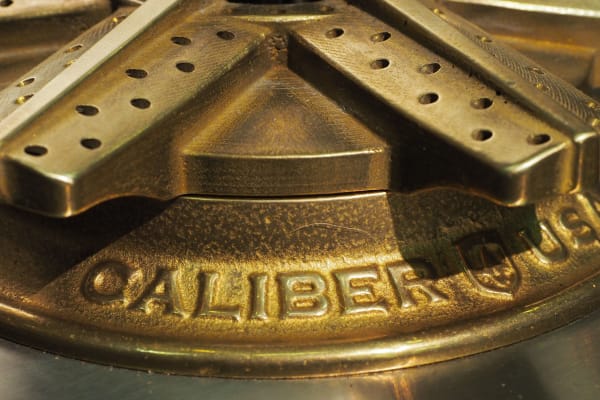 Caliber brass burners