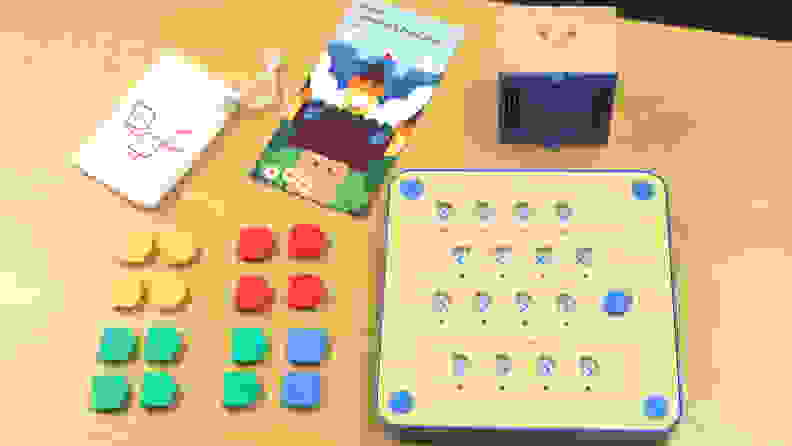 Cubetto comes with tiles, a control board, Cubetto himself, a storybook, and a playmat