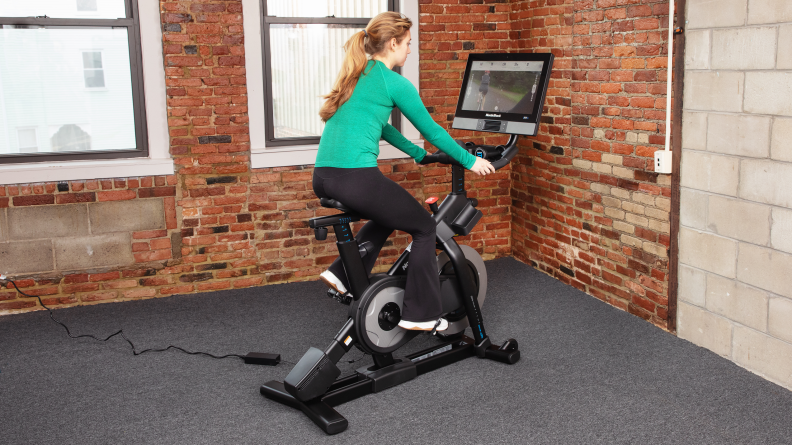 Woman leaning forward on NordicTrack S22i