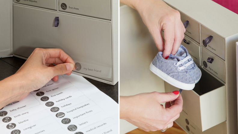 A person puts away baby keepsakes into a drawer.