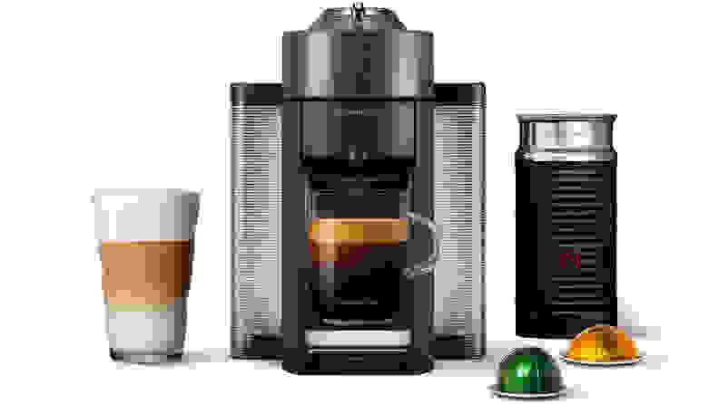 A black Nespresso Evoluo single-serve coffee maker.