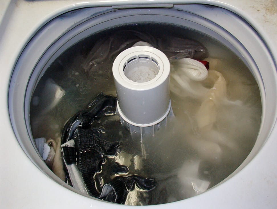 Dirty laundry water in a top load washer