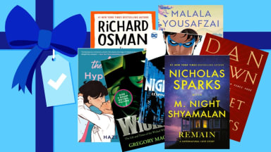 A pile of books on a blue gift background