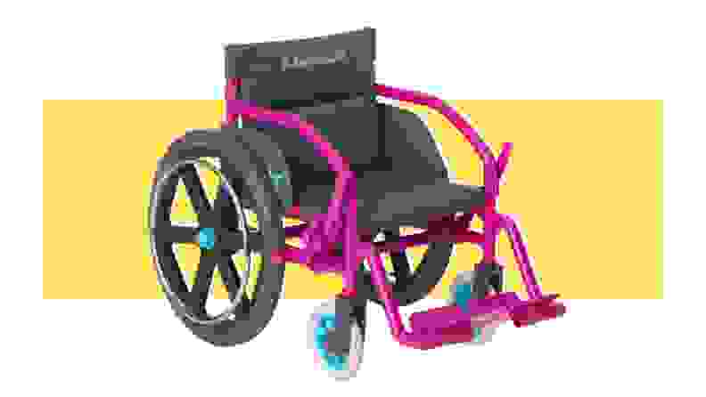 An American Girl Ultralight Wheelchair in the colors purple, blue, and black on a yellow background.