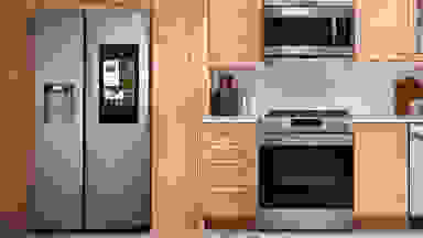 The Samsung RS27T5561SR Side-by-Side Refrigerator in a modern kitchen, alongside other Samsung kitchen appliances.