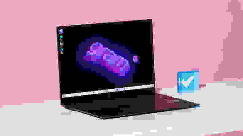 The LG gram Pro 17 laptop on a white desk with a pink background.