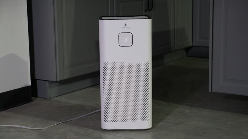 A Medify MA-50 air purifier sits on a carpet.
