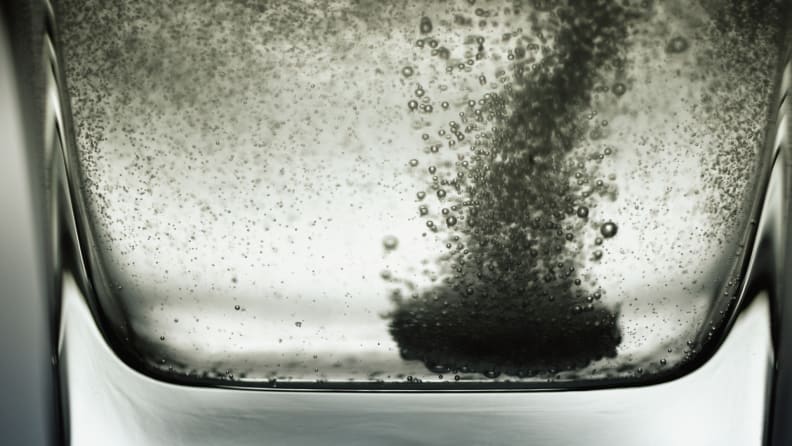 A tablet dissolving in a glass of water