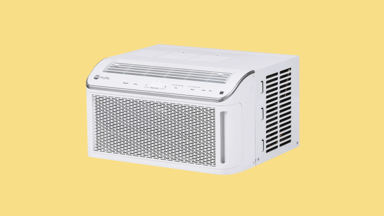 The GE Profile PHC08LY air conditioner on a yellow background