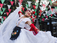 Woman dancing in a Mexican culture celebration