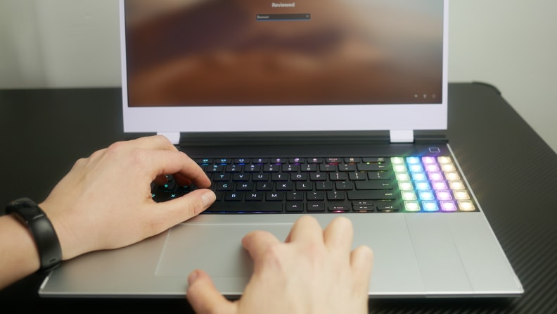 A person typing on the Framework Laptop 16.
