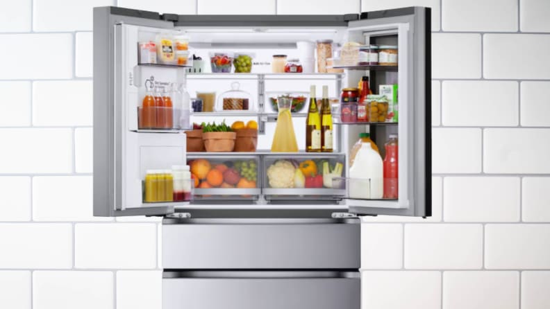 A French-door refrigerator with open top doors