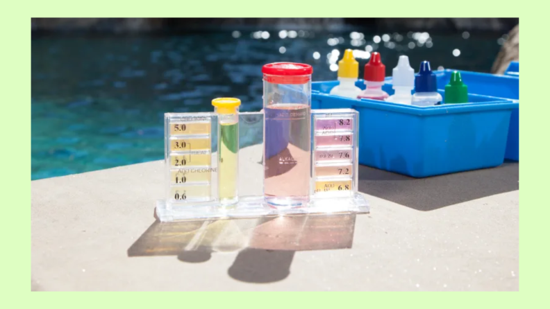 A variety of cleaning products next to a pool.