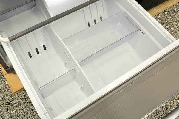 The lower freezer drawer offers multiple dividers, as well as a sliding bucket, to help organize the large space.