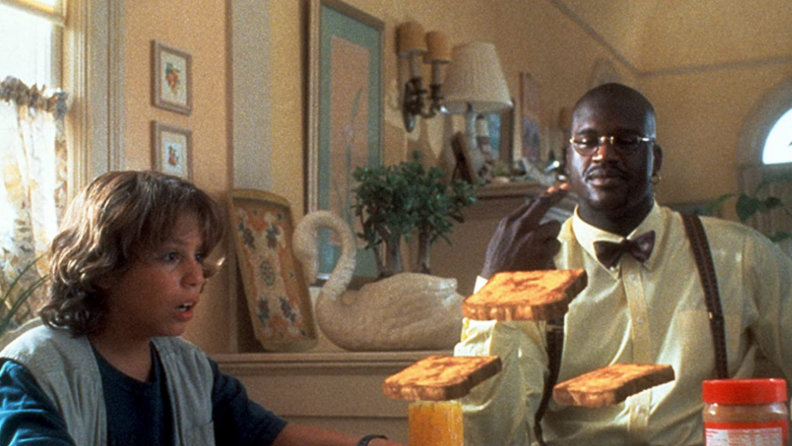 A still from 'Kazaam' featuring Shaquille O'Neal and Francis Capra.