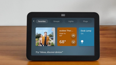 A black Amazon Echo Show 8 sits on a table.