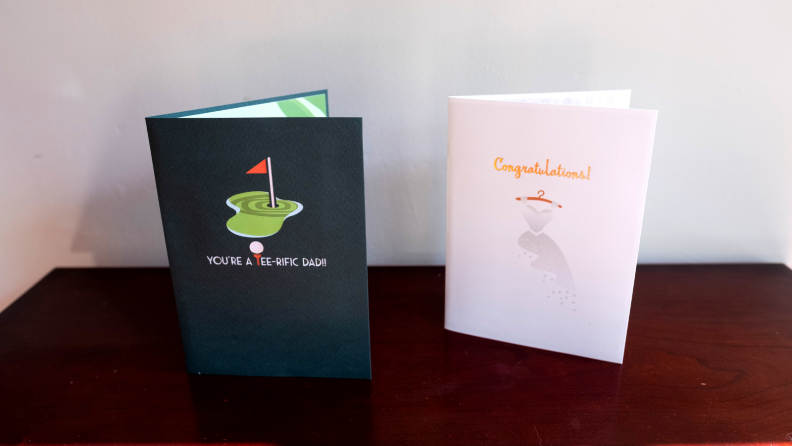 Two greeting cards next to each other on a table.
