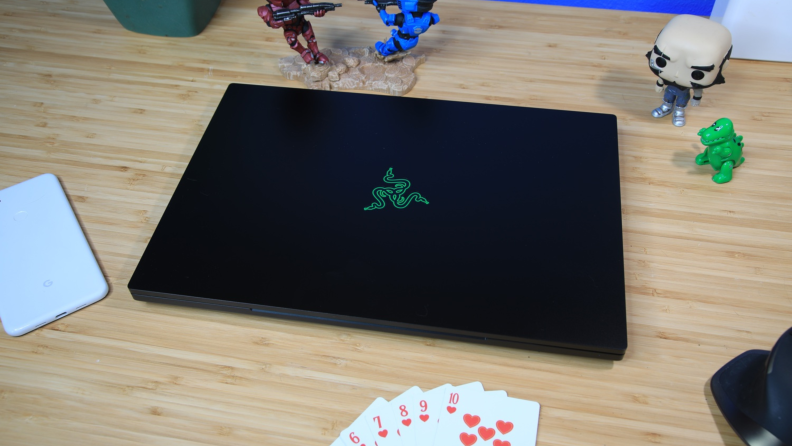 The Razer Blade 16, closed, on a desk.