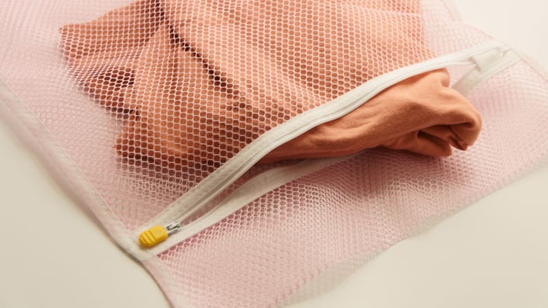 Some clothes are safe to machine wash if you put them in a laundry bag.