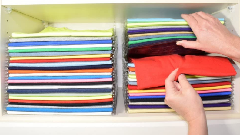 Colorful shirts stacked / Hand pulling shirt out of stack