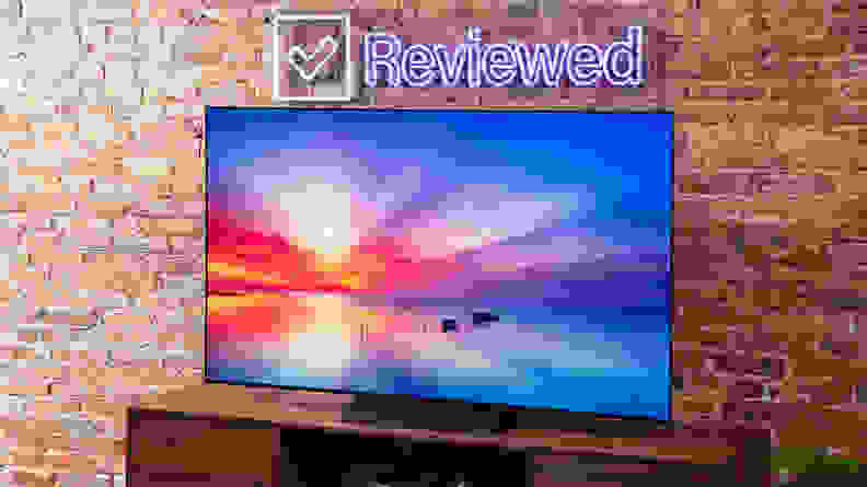 Angled photo of the LG C3 OLED TV showing a vibrant, multicolored sky.