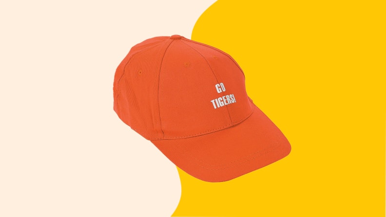 An orange cloth baseball cap that says "Go Tigers"