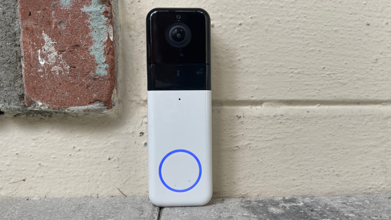 The Wyze Video Doorbell Pro sits on a patio