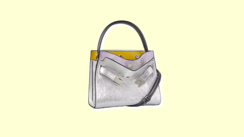 Photo of the Tory Burch Petite Lee Radziwill Metallic Double Bag against a light yellow background.