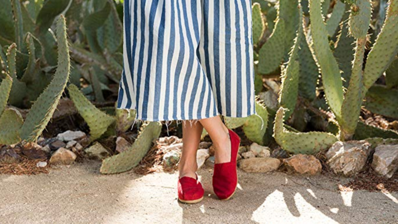 Woman wearing Toms shoes