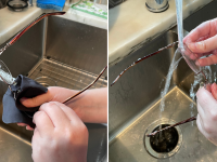 Author cleaning glasses with a black microfiber cloth and rinsing glasses with water over sink