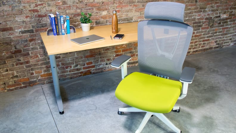 An Autonomous ErgoChair 2 with a desk, among the best 30th birthday gift ideas.