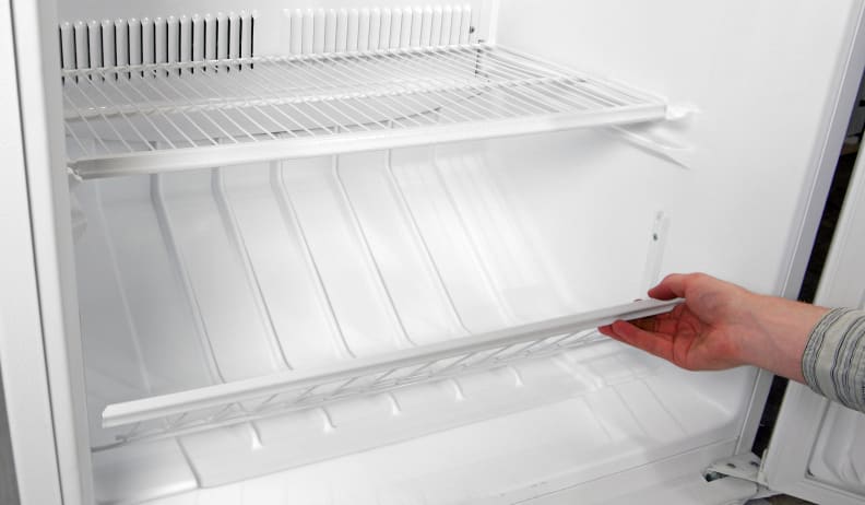 The Whirlpool EV160NZTQ's lower compartment is built into the bottom of the freezer with a gate-like barrier to keep the food in.