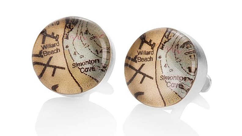 Cufflinks with maps on it.