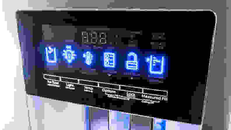 A close-up of the touch buttons atop the dispenser on the exterior of the Whirlpool WRX735SDHZ French door refrigerator.