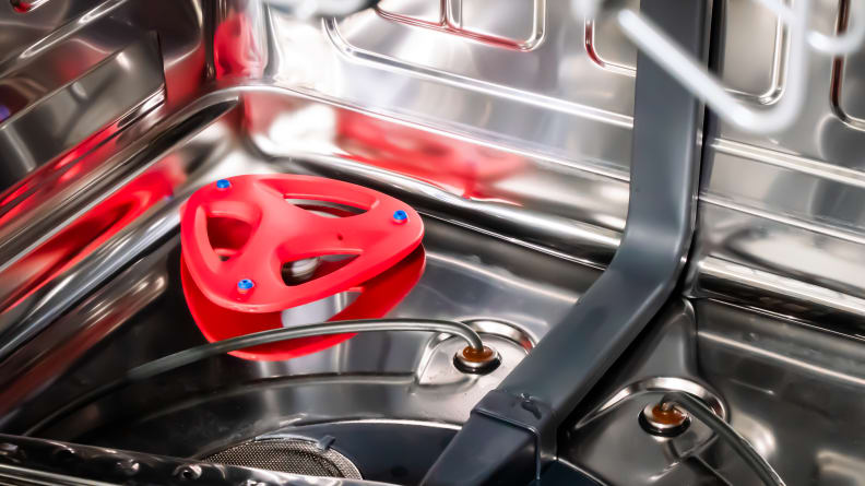 The Vinotemp Brama BR-DWSH01-S dishwasher's Turbo Wash spigot—a bright red, triangular node located in the back left of the dishwasher's tub.