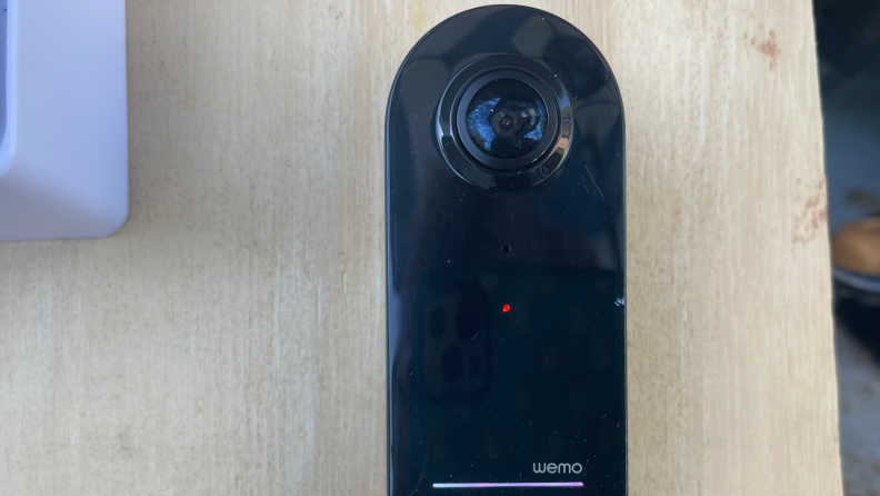 A red status light shown on the front of a video doorbell