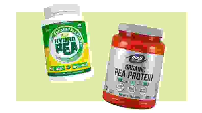 Two jugs of protein powder from HydroPea and Now Nutrition.