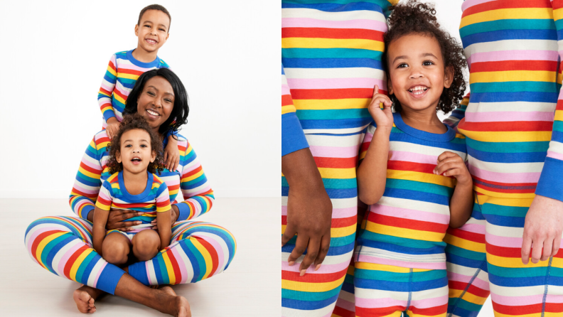左边，一家三口穿着彩虹条纹睡衣，面带微笑。在左边，年轻的女孩微笑在她的父母之间，而彩虹睡衣。